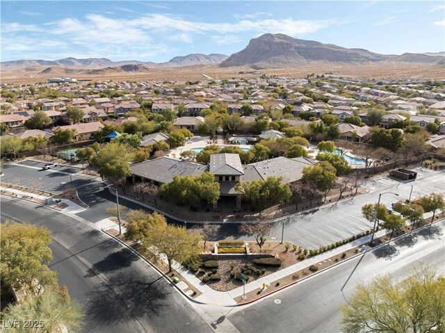 aerial view featuring a mountain view and a residential view