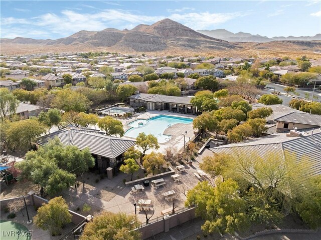 drone / aerial view with a residential view and a mountain view