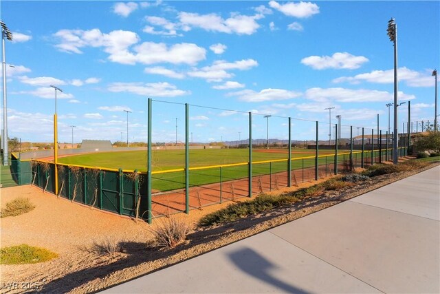 surrounding community featuring fence