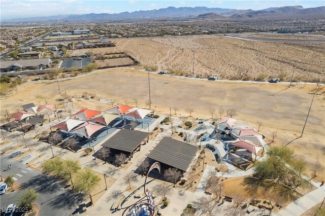 bird's eye view featuring a desert view and a mountain view