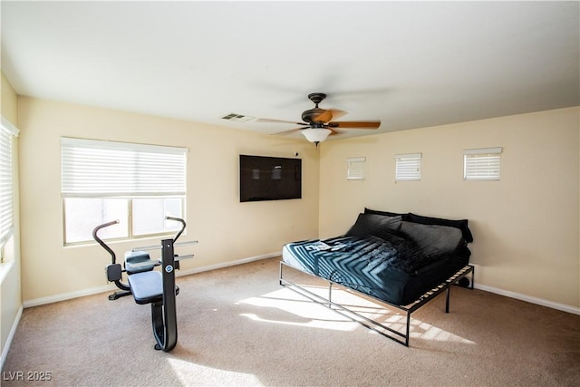 carpeted bedroom featuring ceiling fan