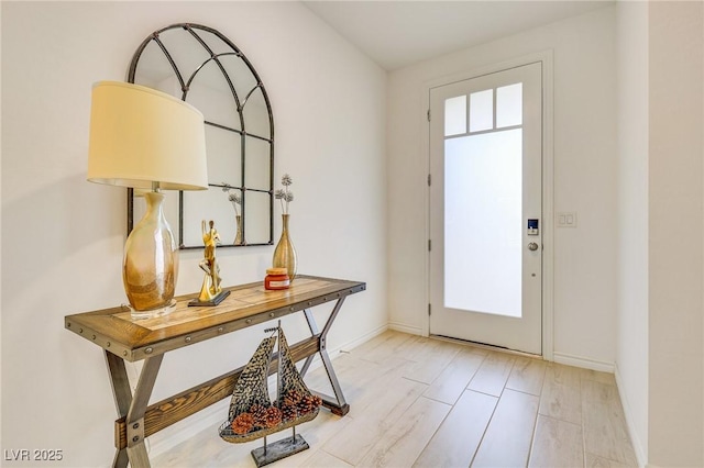 entrance foyer featuring light hardwood / wood-style floors