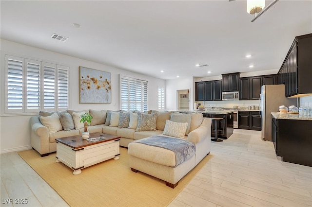 living room featuring light hardwood / wood-style flooring