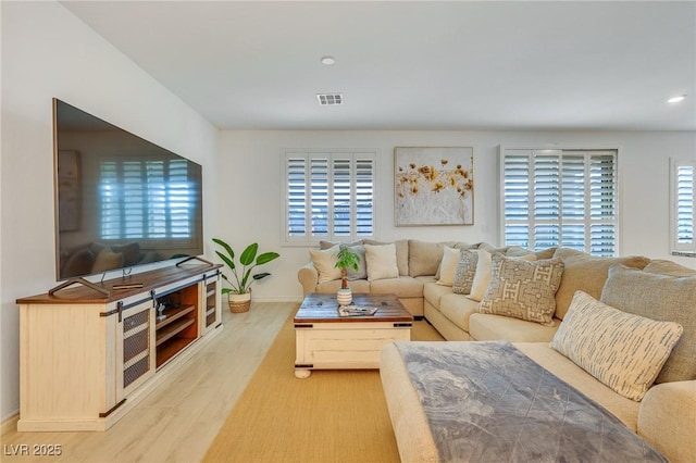 living room featuring light wood-type flooring