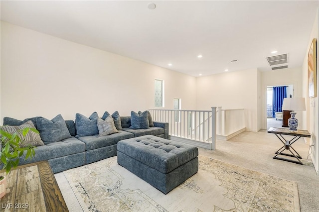 living room with light colored carpet