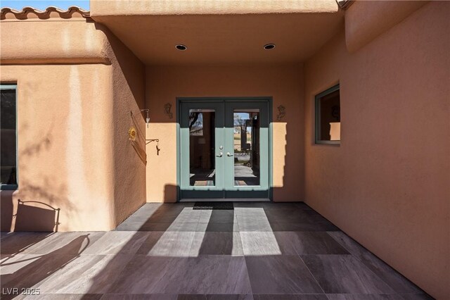 doorway to property featuring french doors