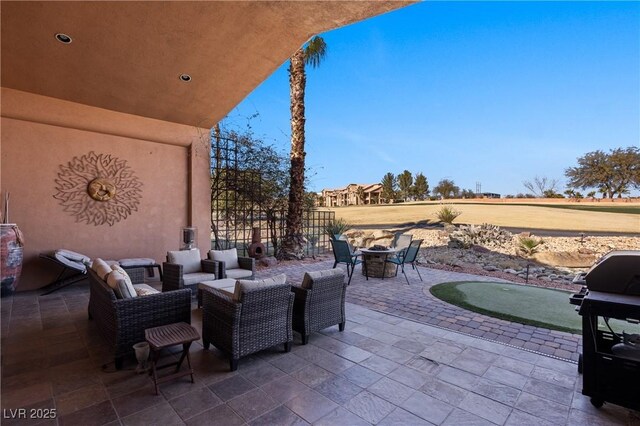 view of patio / terrace with grilling area and outdoor lounge area