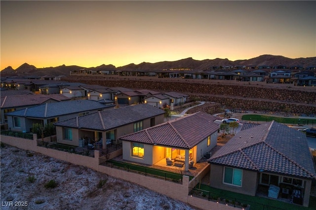 aerial view at dusk with a mountain view