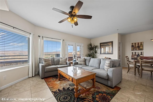 tiled living room featuring ceiling fan