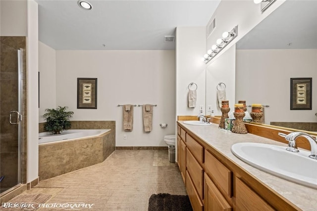 full bathroom with tile patterned flooring, vanity, independent shower and bath, and toilet