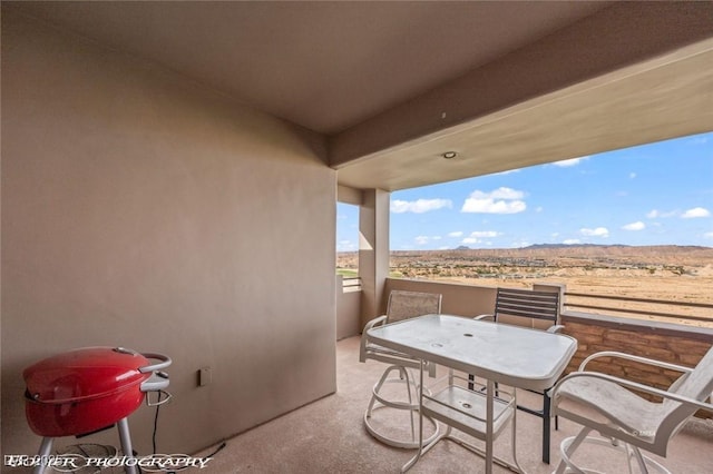 view of patio / terrace featuring a balcony