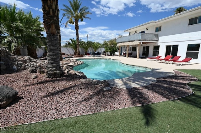 view of pool featuring a patio