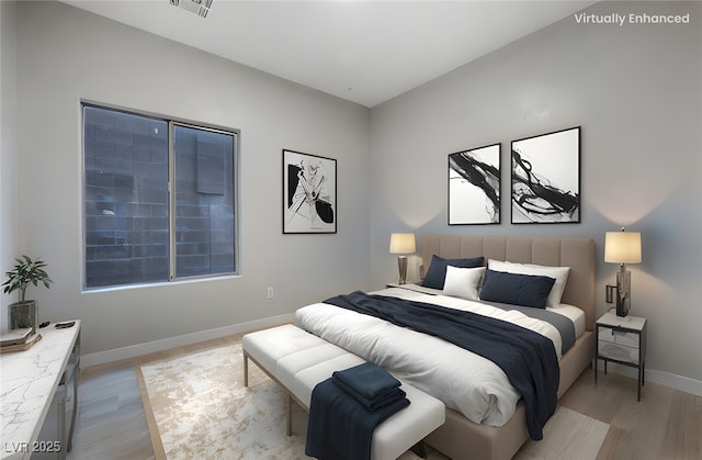 bedroom with light wood-type flooring