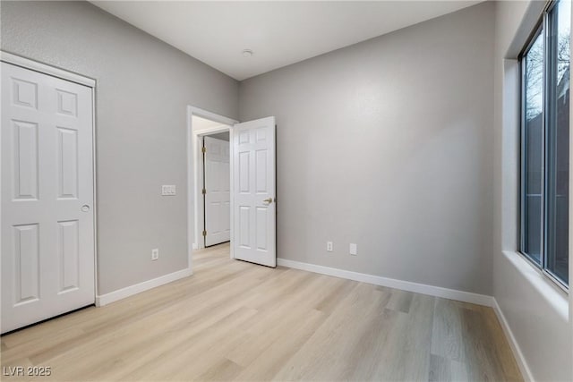 unfurnished bedroom featuring light hardwood / wood-style floors