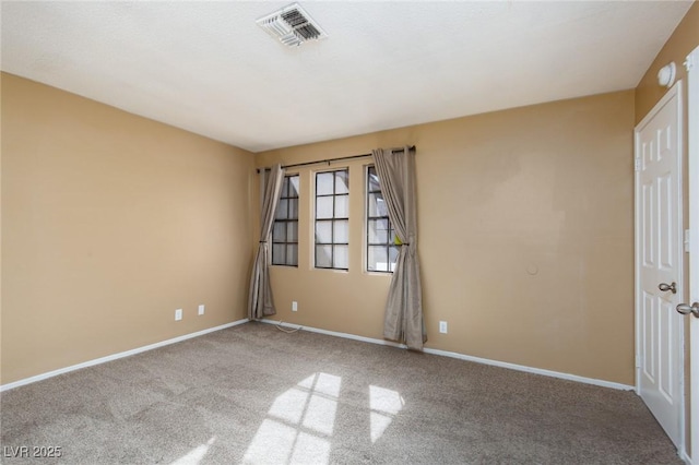 unfurnished room featuring carpet floors