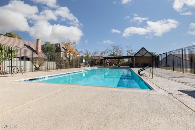 view of pool featuring a patio