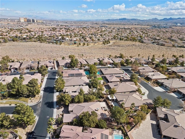 aerial view featuring a mountain view