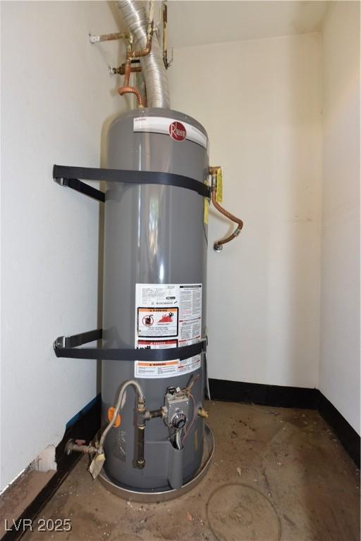 utility room with secured water heater