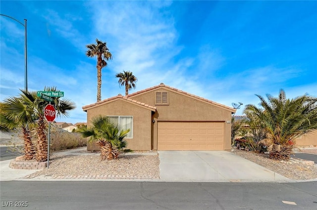 view of front of home with a garage