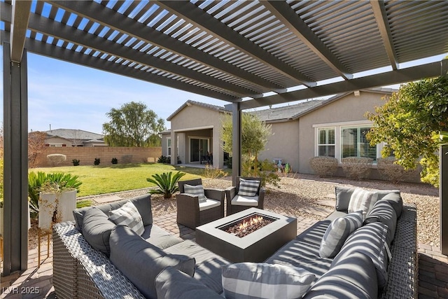 view of patio / terrace with an outdoor living space with a fire pit and fence