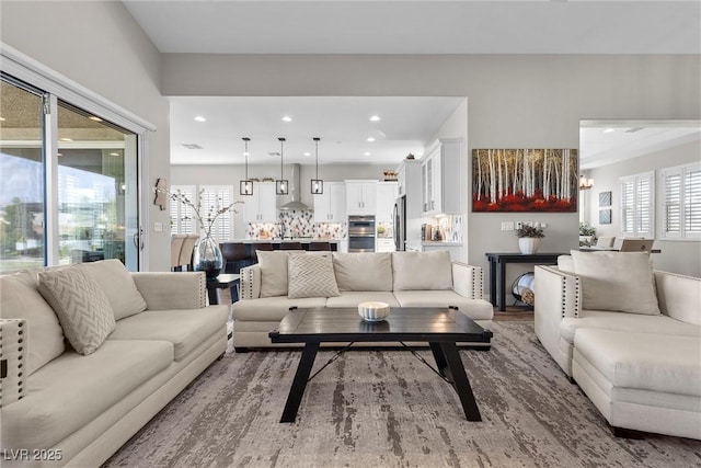 living room featuring recessed lighting