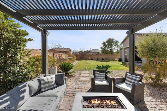 view of patio / terrace with an outdoor living space with a fire pit, a fenced backyard, and a pergola