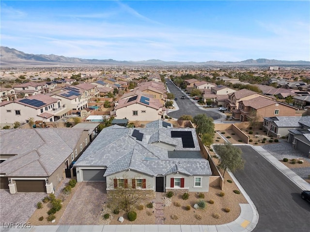 bird's eye view with a residential view and a mountain view