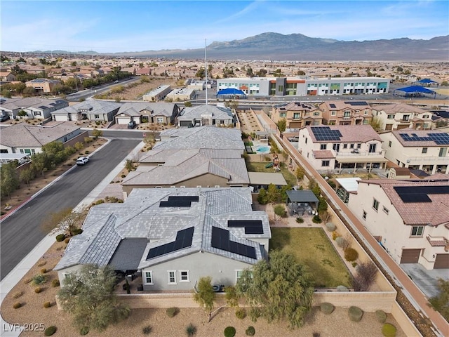 aerial view featuring a mountain view and a residential view