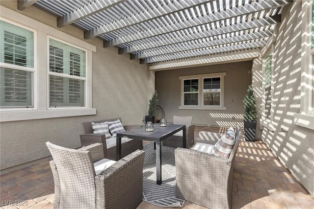 view of patio with an outdoor living space and a pergola