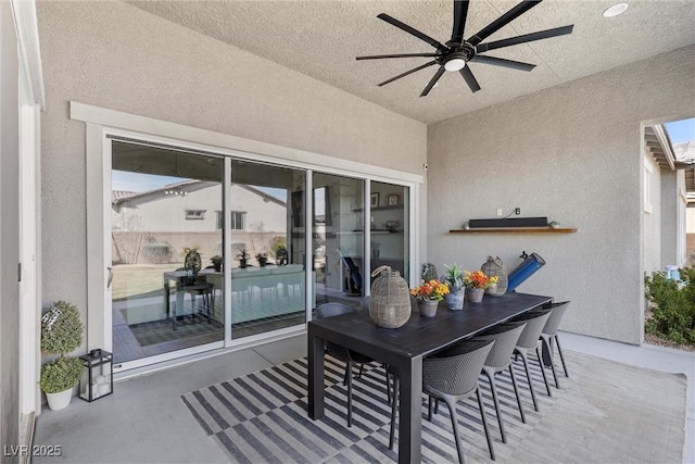 view of patio with ceiling fan