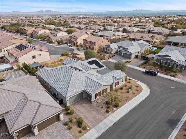 bird's eye view featuring a residential view and a mountain view