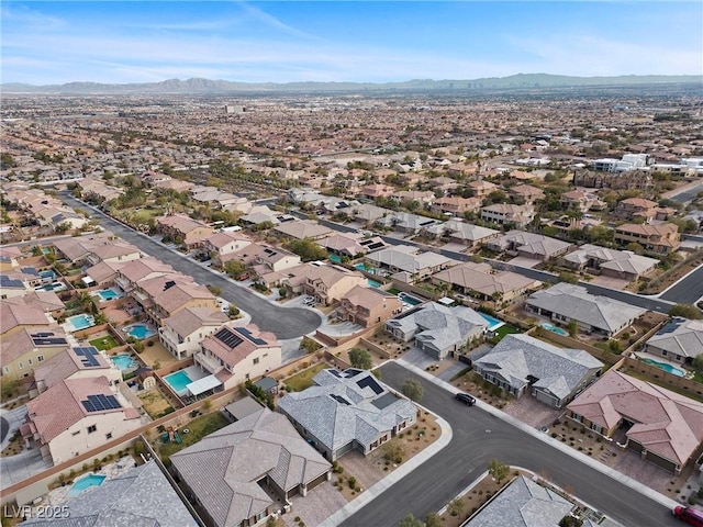 aerial view with a residential view and a mountain view