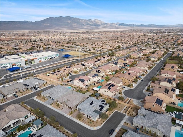 bird's eye view featuring a residential view and a mountain view