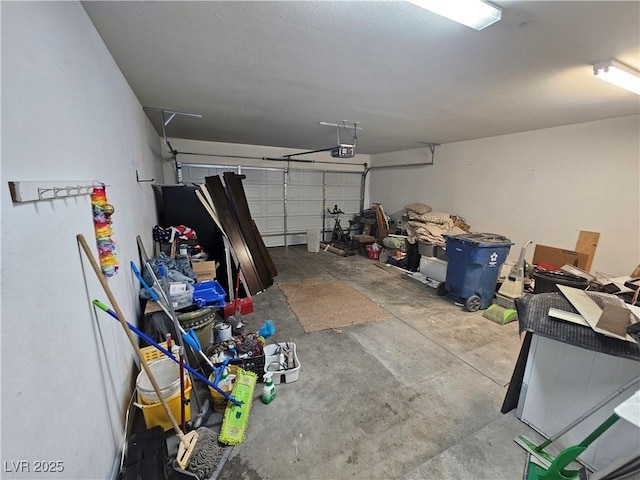 garage featuring a garage door opener