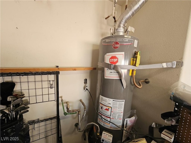 utility room with gas water heater