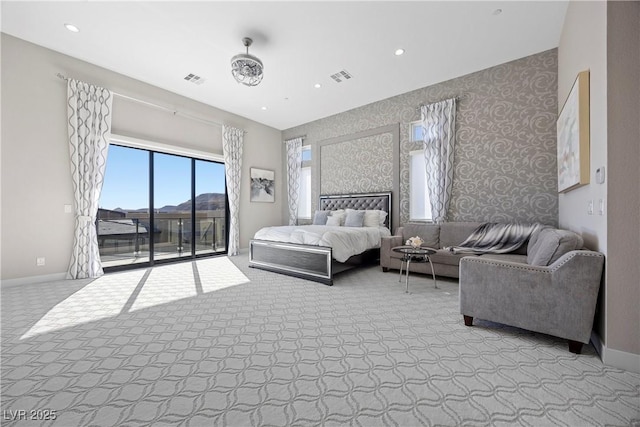 carpeted bedroom featuring access to outside