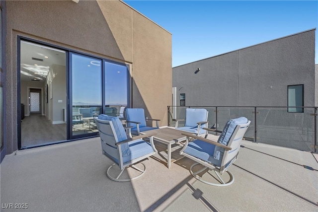 view of patio / terrace featuring a balcony