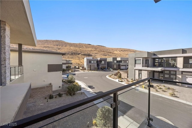 balcony featuring a mountain view