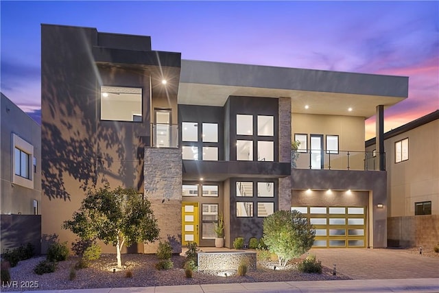 modern home featuring a garage