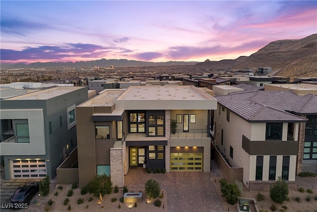 view of front of home featuring a mountain view