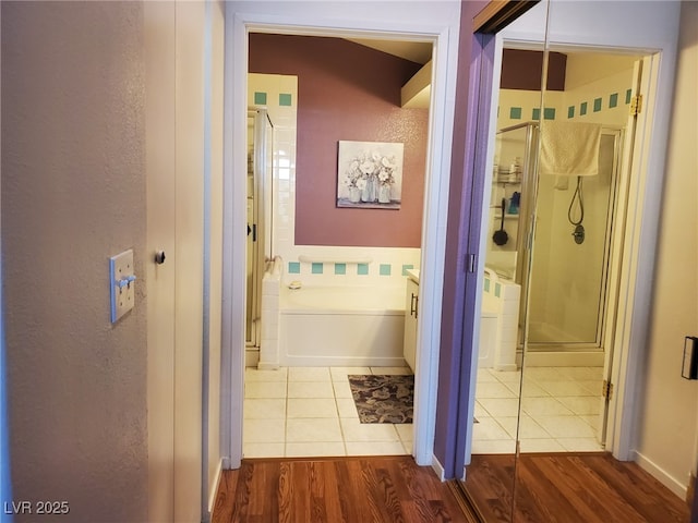 bathroom with vanity, separate shower and tub, and hardwood / wood-style floors