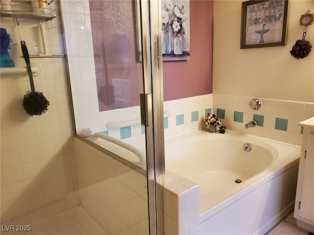 bathroom featuring a tub to relax in