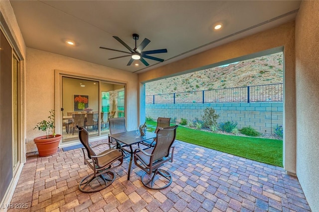 view of patio / terrace with ceiling fan