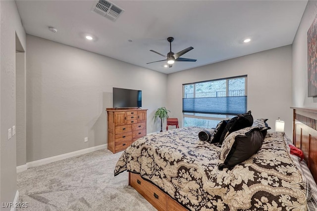 bedroom featuring ceiling fan and light colored carpet