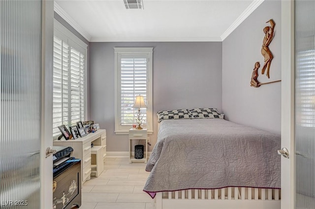 bedroom with ornamental molding