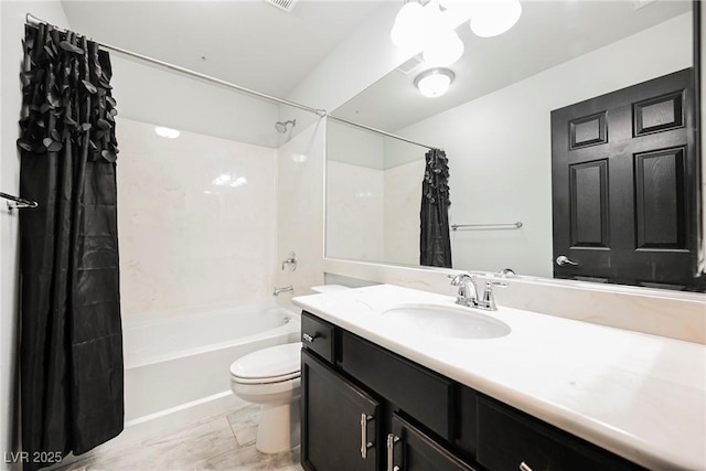 full bathroom with shower / tub combo with curtain, vanity, and toilet