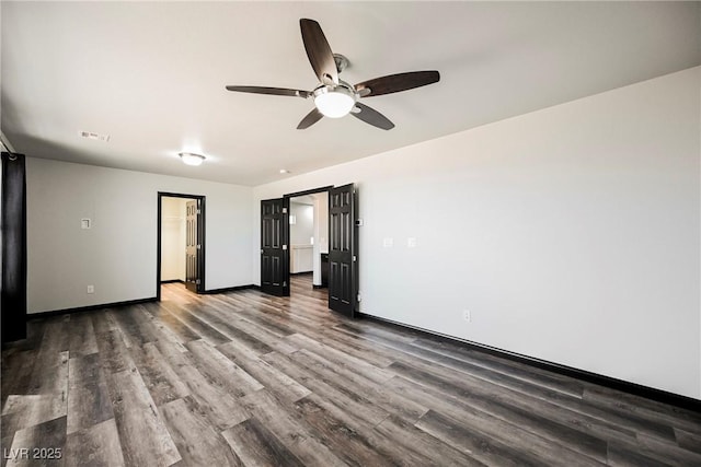 empty room with wood-type flooring