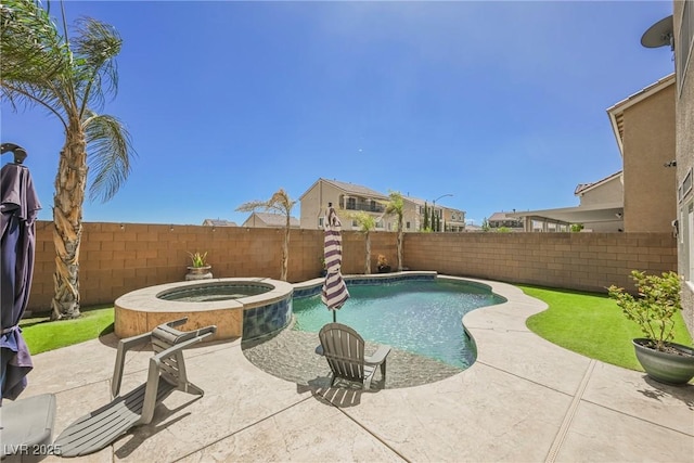 view of swimming pool with a patio and an in ground hot tub