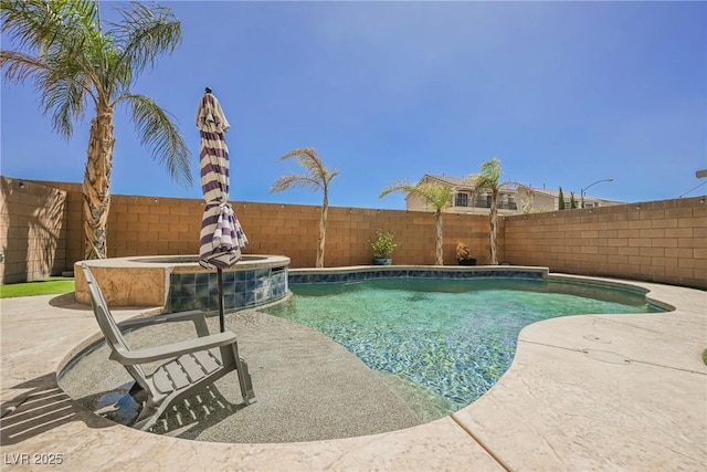 view of swimming pool with an in ground hot tub and a patio