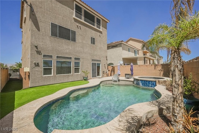 view of pool featuring an in ground hot tub and a patio